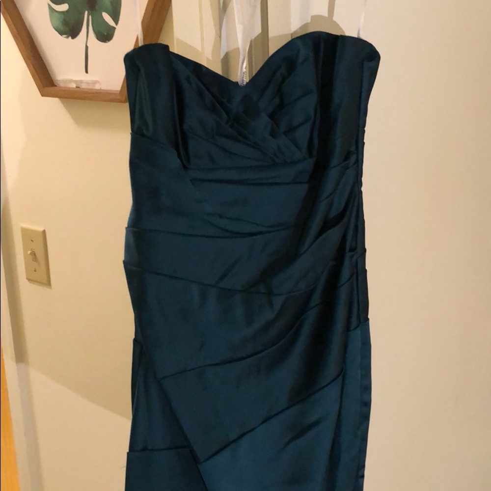 Emerald green satin dress by David’s bridal